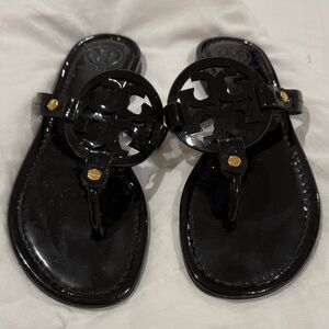 Tory Burch Glossy Black Sandals with Gold Details
